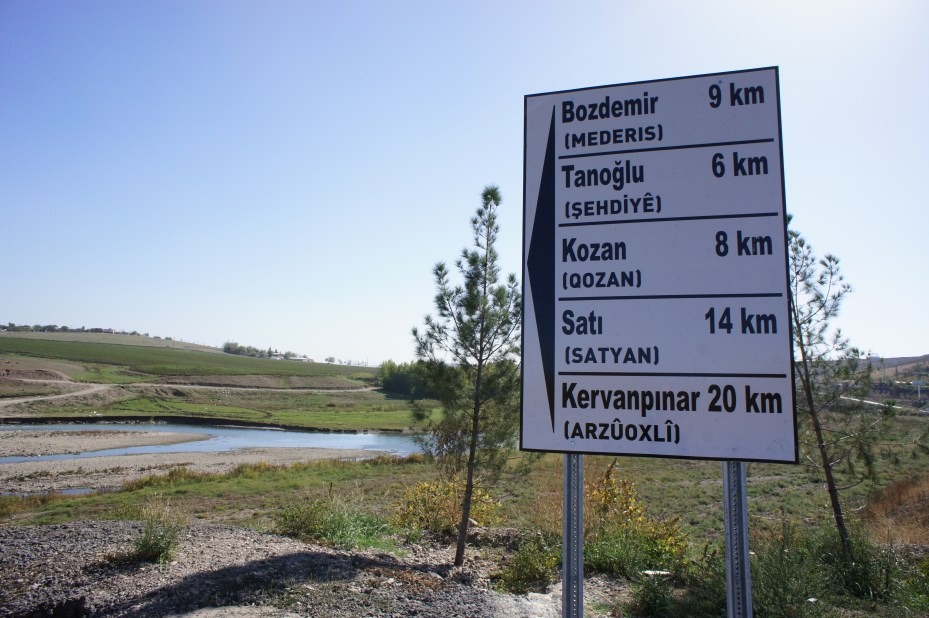 “Road sign double toponyms Amed DSC00179” by MikaelF — Own work. Licensed under CC BY-SA 3.0 via Commons